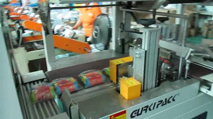【日用品行业】固尔琦自动封切热收缩机在包装袋包装中的应用